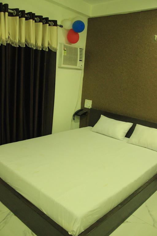 Hotel Divine Inn Varanasi Quarto foto